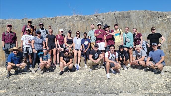 学生 in Ellen Barnett's GNED 1342 pose for a photo while on their Canyon Lake Gorge trip